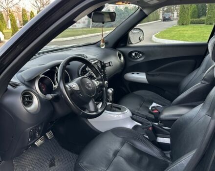 Чорний Ніссан Жук, об'ємом двигуна 1.6 л та пробігом 216 тис. км за 11000 $, фото 9 на Automoto.ua