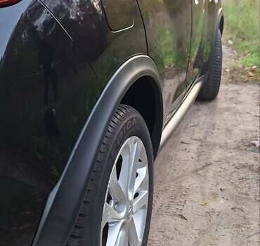 Черный Ниссан Жук, объемом двигателя 1.6 л и пробегом 170 тыс. км за 11000 $, фото 7 на Automoto.ua