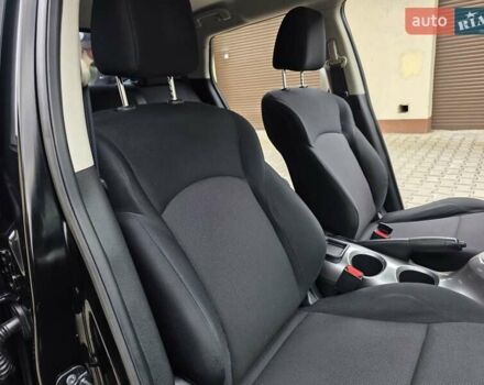 Черный Ниссан Жук, объемом двигателя 1.6 л и пробегом 105 тыс. км за 9499 $, фото 80 на Automoto.ua