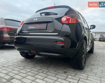 Черный Ниссан Жук, объемом двигателя 1.6 л и пробегом 190 тыс. км за 10850 $, фото 11 на Automoto.ua