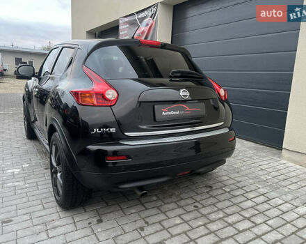 Черный Ниссан Жук, объемом двигателя 1.6 л и пробегом 190 тыс. км за 10850 $, фото 13 на Automoto.ua
