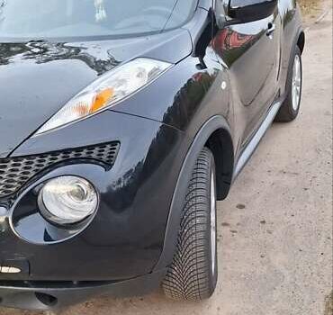 Черный Ниссан Жук, объемом двигателя 1.6 л и пробегом 170 тыс. км за 11000 $, фото 8 на Automoto.ua