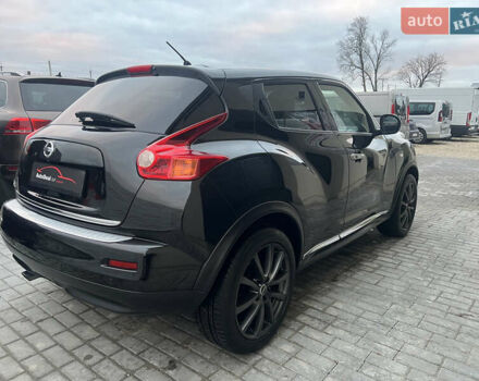 Черный Ниссан Жук, объемом двигателя 1.6 л и пробегом 190 тыс. км за 10850 $, фото 8 на Automoto.ua