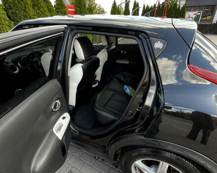 Черный Ниссан Жук, объемом двигателя 1.6 л и пробегом 115 тыс. км за 9900 $, фото 7 на Automoto.ua