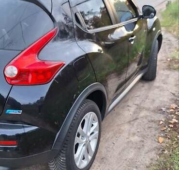 Черный Ниссан Жук, объемом двигателя 1.6 л и пробегом 170 тыс. км за 11000 $, фото 6 на Automoto.ua