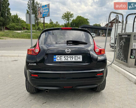 Чорний Ніссан Жук, об'ємом двигуна 1.6 л та пробігом 239 тис. км за 10000 $, фото 3 на Automoto.ua