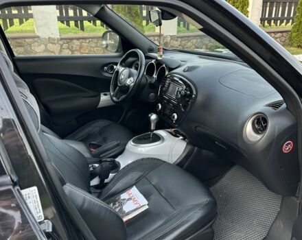 Чорний Ніссан Жук, об'ємом двигуна 1.6 л та пробігом 216 тис. км за 11000 $, фото 8 на Automoto.ua