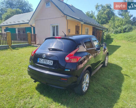 Черный Ниссан Жук, объемом двигателя 1.46 л и пробегом 190 тыс. км за 9600 $, фото 5 на Automoto.ua