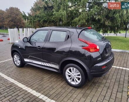 Черный Ниссан Жук, объемом двигателя 1.6 л и пробегом 237 тыс. км за 10900 $, фото 6 на Automoto.ua