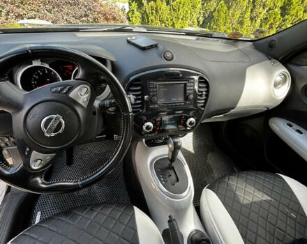 Черный Ниссан Жук, объемом двигателя 1.6 л и пробегом 115 тыс. км за 9900 $, фото 10 на Automoto.ua