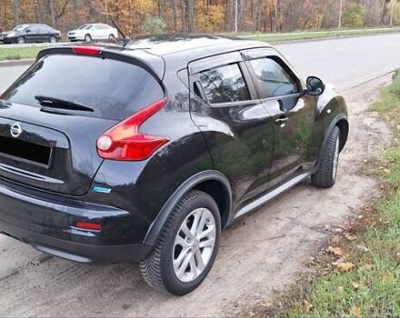 Черный Ниссан Жук, объемом двигателя 1.6 л и пробегом 170 тыс. км за 11000 $, фото 9 на Automoto.ua