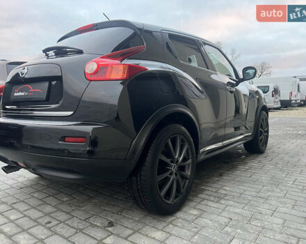 Черный Ниссан Жук, объемом двигателя 1.6 л и пробегом 190 тыс. км за 10850 $, фото 10 на Automoto.ua