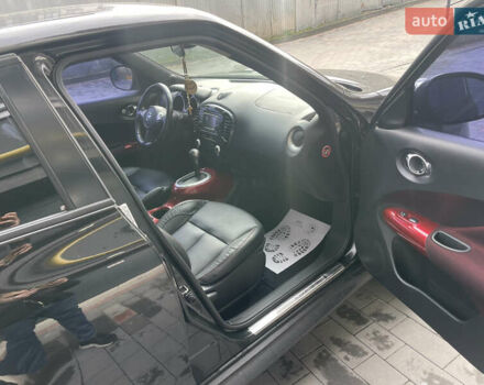 Черный Ниссан Жук, объемом двигателя 1.6 л и пробегом 159 тыс. км за 9500 $, фото 6 на Automoto.ua