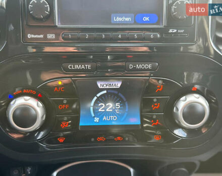 Черный Ниссан Жук, объемом двигателя 1.6 л и пробегом 145 тыс. км за 10600 $, фото 25 на Automoto.ua