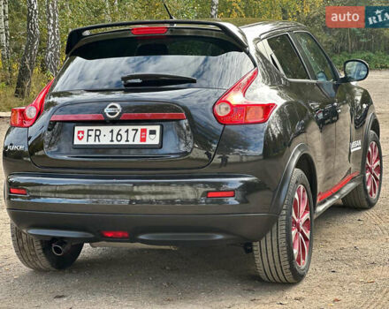 Черный Ниссан Жук, объемом двигателя 1.6 л и пробегом 145 тыс. км за 10600 $, фото 11 на Automoto.ua