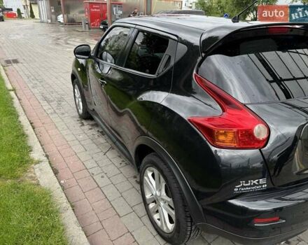 Черный Ниссан Жук, объемом двигателя 1.6 л и пробегом 121 тыс. км за 10888 $, фото 4 на Automoto.ua