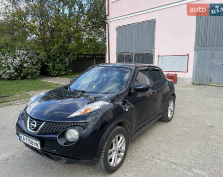 Черный Ниссан Жук, объемом двигателя 1.62 л и пробегом 150 тыс. км за 9750 $, фото 1 на Automoto.ua