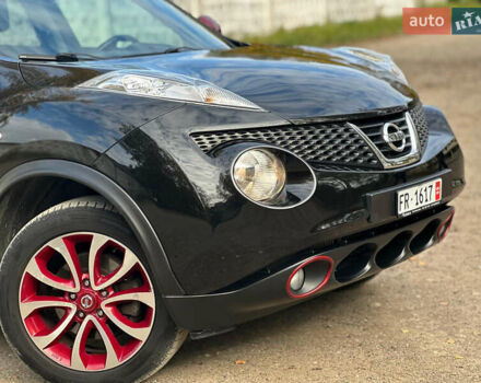 Черный Ниссан Жук, объемом двигателя 1.6 л и пробегом 145 тыс. км за 10600 $, фото 4 на Automoto.ua