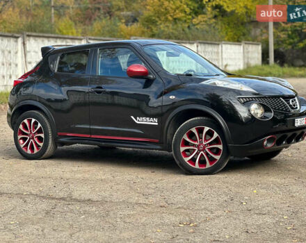 Черный Ниссан Жук, объемом двигателя 1.6 л и пробегом 145 тыс. км за 10600 $, фото 5 на Automoto.ua