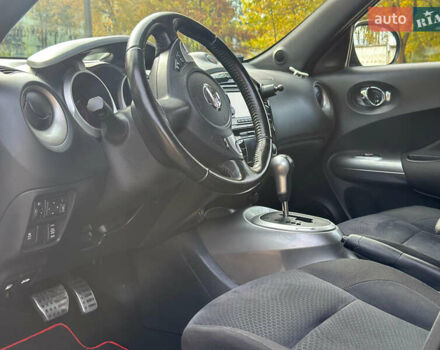 Черный Ниссан Жук, объемом двигателя 1.6 л и пробегом 145 тыс. км за 10600 $, фото 15 на Automoto.ua