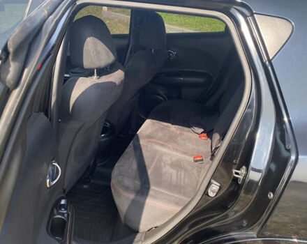 Черный Ниссан Жук, объемом двигателя 1.6 л и пробегом 169 тыс. км за 11800 $, фото 7 на Automoto.ua