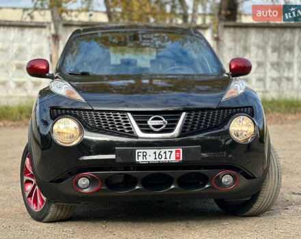 Черный Ниссан Жук, объемом двигателя 1.6 л и пробегом 145 тыс. км за 10600 $, фото 1 на Automoto.ua