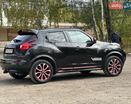 Черный Ниссан Жук, объемом двигателя 1.6 л и пробегом 145 тыс. км за 10600 $, фото 13 на Automoto.ua