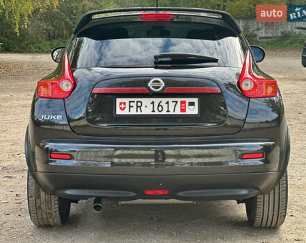 Черный Ниссан Жук, объемом двигателя 1.6 л и пробегом 145 тыс. км за 10600 $, фото 10 на Automoto.ua