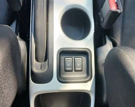 Черный Ниссан Жук, объемом двигателя 1.6 л и пробегом 118 тыс. км за 8300 $, фото 13 на Automoto.ua