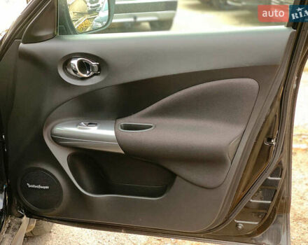 Черный Ниссан Жук, объемом двигателя 1.6 л и пробегом 100 тыс. км за 13390 $, фото 19 на Automoto.ua