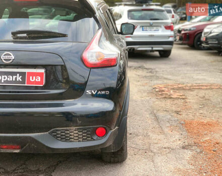 Черный Ниссан Жук, объемом двигателя 1.6 л и пробегом 100 тыс. км за 13390 $, фото 11 на Automoto.ua