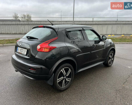 Черный Ниссан Жук, объемом двигателя 1.6 л и пробегом 172 тыс. км за 10900 $, фото 2 на Automoto.ua