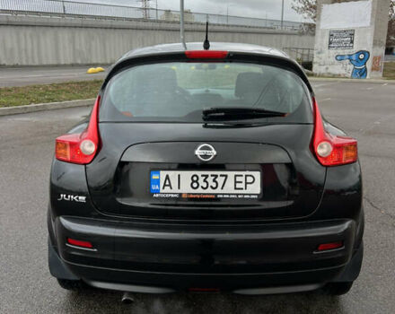 Черный Ниссан Жук, объемом двигателя 1.6 л и пробегом 172 тыс. км за 10900 $, фото 7 на Automoto.ua