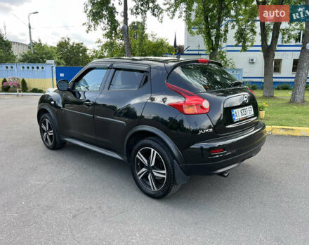 Черный Ниссан Жук, объемом двигателя 1.6 л и пробегом 172 тыс. км за 11600 $, фото 1 на Automoto.ua