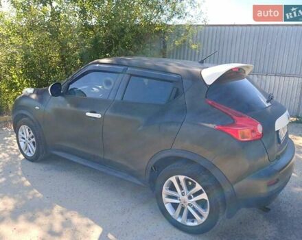 Черный Ниссан Жук, объемом двигателя 1.6 л и пробегом 118 тыс. км за 8300 $, фото 4 на Automoto.ua