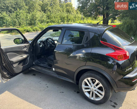 Черный Ниссан Жук, объемом двигателя 1.6 л и пробегом 75 тыс. км за 12700 $, фото 1 на Automoto.ua