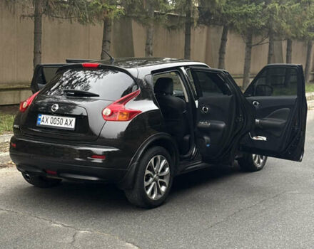 Чорний Ніссан Жук, об'ємом двигуна 1.62 л та пробігом 78 тис. км за 11800 $, фото 25 на Automoto.ua