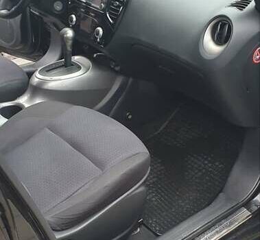 Чорний Ніссан Жук, об'ємом двигуна 1.6 л та пробігом 108 тис. км за 12000 $, фото 13 на Automoto.ua