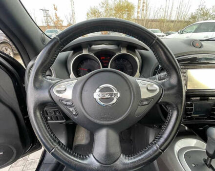 Черный Ниссан Жук, объемом двигателя 1.6 л и пробегом 120 тыс. км за 10900 $, фото 17 на Automoto.ua