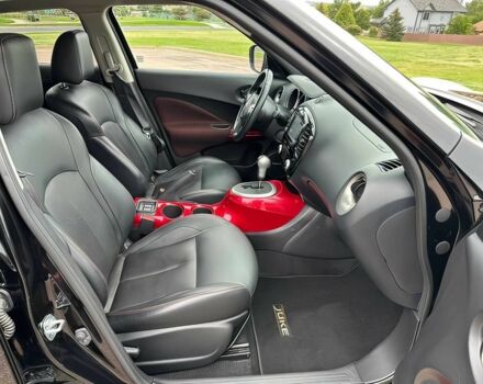 Черный Ниссан Жук, объемом двигателя 1.6 л и пробегом 79 тыс. км за 6200 $, фото 11 на Automoto.ua