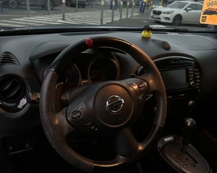 Черный Ниссан Жук, объемом двигателя 1.6 л и пробегом 137 тыс. км за 12500 $, фото 10 на Automoto.ua