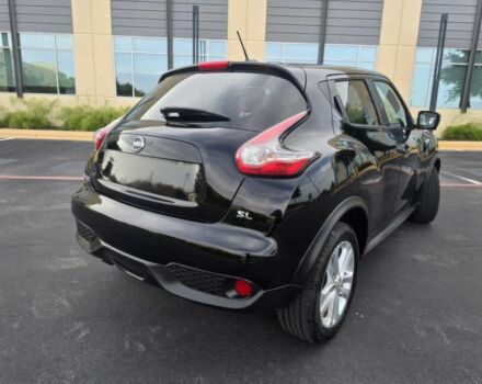 Черный Ниссан Жук, объемом двигателя 1.6 л и пробегом 70 тыс. км за 4800 $, фото 5 на Automoto.ua