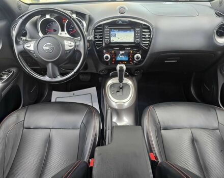 Черный Ниссан Жук, объемом двигателя 1.6 л и пробегом 70 тыс. км за 10000 $, фото 7 на Automoto.ua