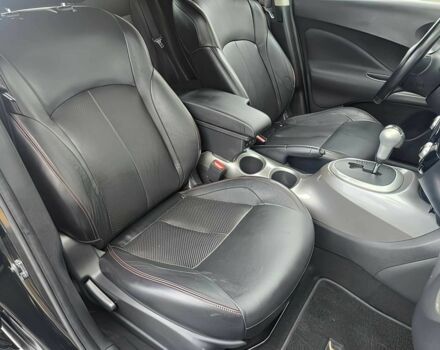 Черный Ниссан Жук, объемом двигателя 1.6 л и пробегом 70 тыс. км за 10000 $, фото 10 на Automoto.ua