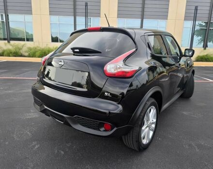 Черный Ниссан Жук, объемом двигателя 1.6 л и пробегом 73 тыс. км за 6000 $, фото 3 на Automoto.ua