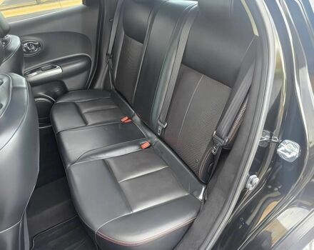 Черный Ниссан Жук, объемом двигателя 1.6 л и пробегом 73 тыс. км за 6000 $, фото 10 на Automoto.ua