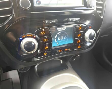 Черный Ниссан Жук, объемом двигателя 1.6 л и пробегом 70 тыс. км за 10000 $, фото 9 на Automoto.ua