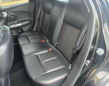 Черный Ниссан Жук, объемом двигателя 1.6 л и пробегом 70 тыс. км за 10000 $, фото 11 на Automoto.ua