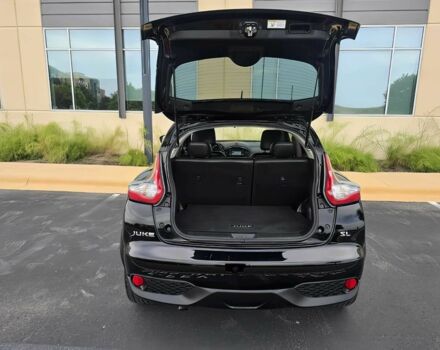 Черный Ниссан Жук, объемом двигателя 1.6 л и пробегом 70 тыс. км за 10000 $, фото 13 на Automoto.ua