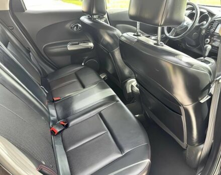 Чорний Ніссан Жук, об'ємом двигуна 1.6 л та пробігом 75 тис. км за 6000 $, фото 9 на Automoto.ua